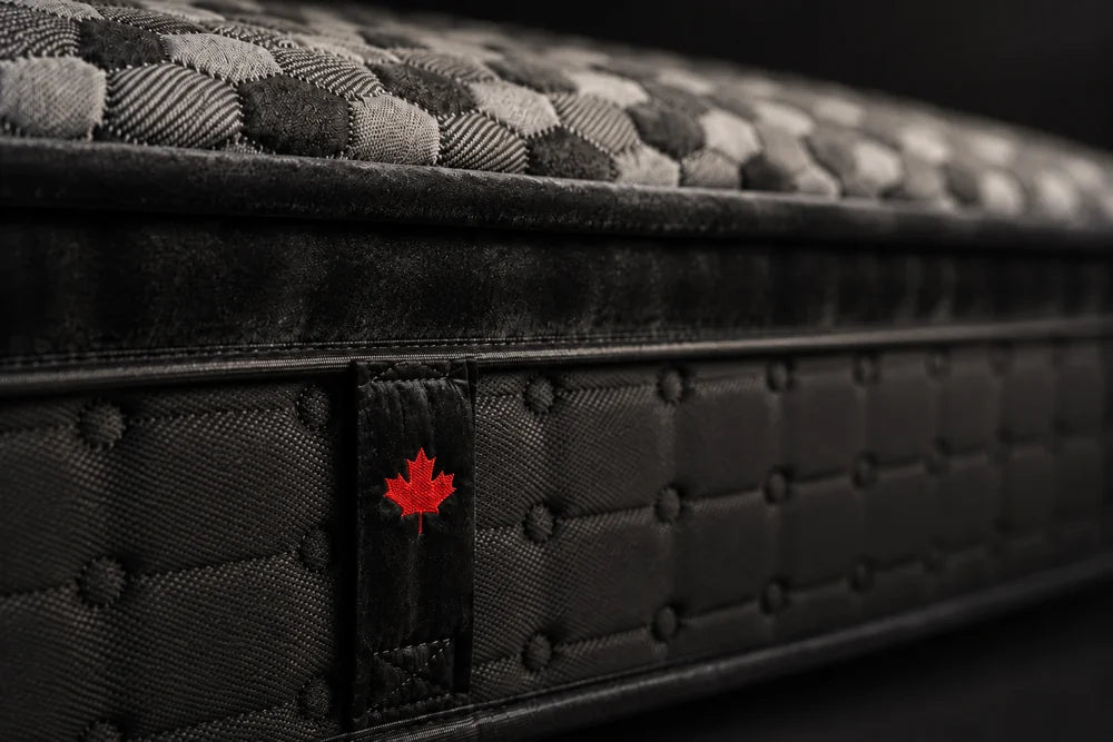 The Artisan’s black velvet border and velvet handle with an embroidered red maple leaf