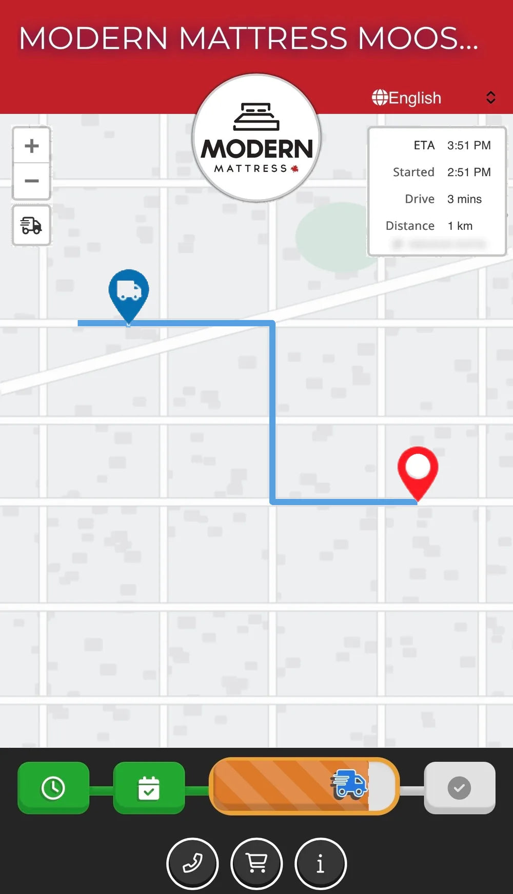 The Modern Mattress delivery tracking screen on a phone, showing the arrival time, with customer details removed