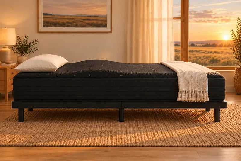 A mattress on an adjustable base flat with the lumbar support raised