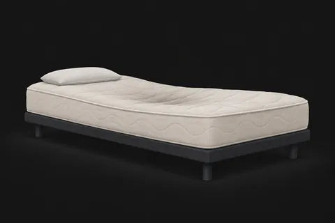 An old mattress with a dip in the middle