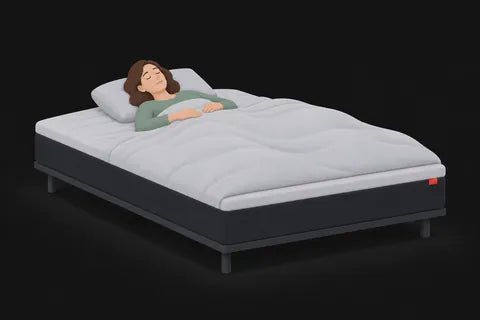 A woman asleep alone in the middle of the bed